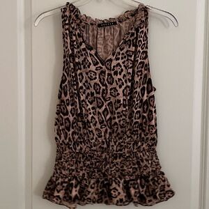 Leopard sleeveless silky top.